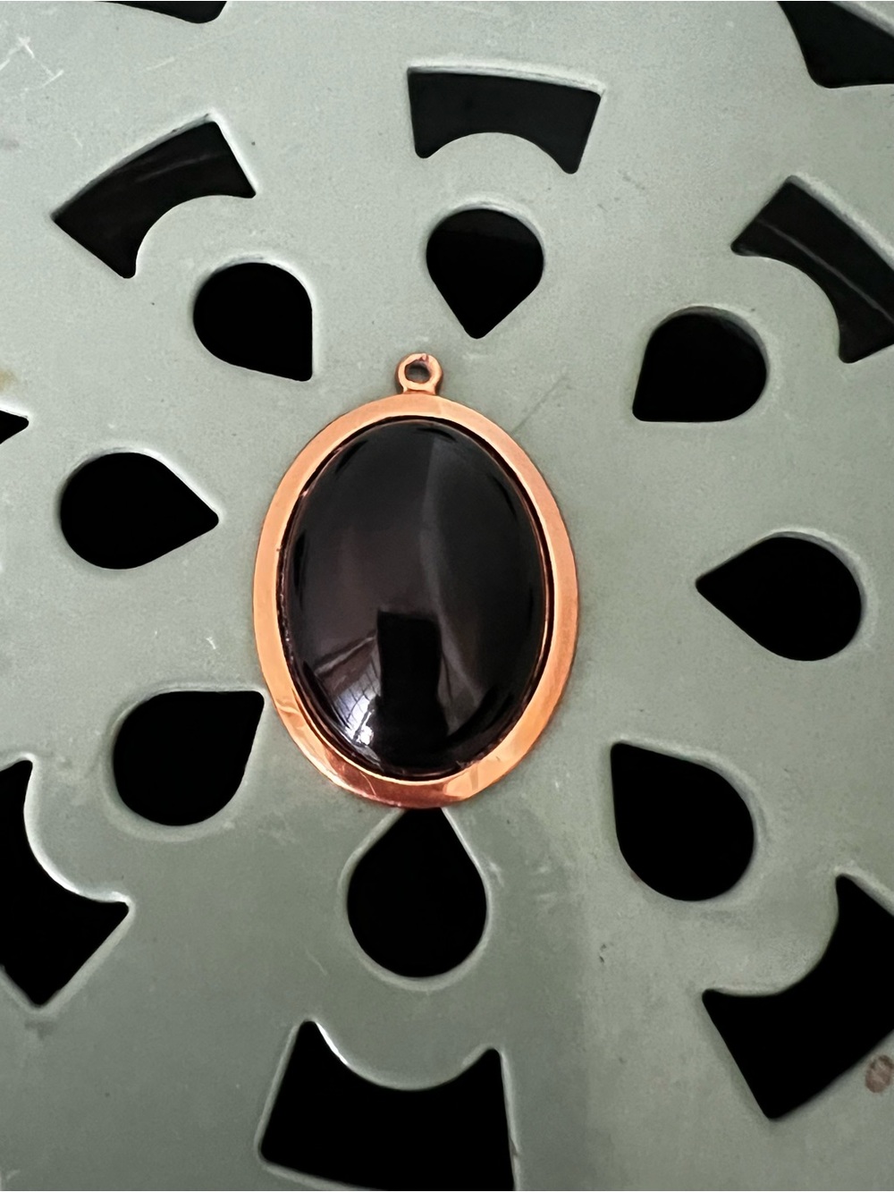 Vintage gold tone black onyx oval pendant